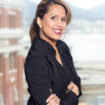 Dr. Samra headshot in a black top